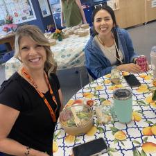 Support staff sitting at an appreciation luncheon.